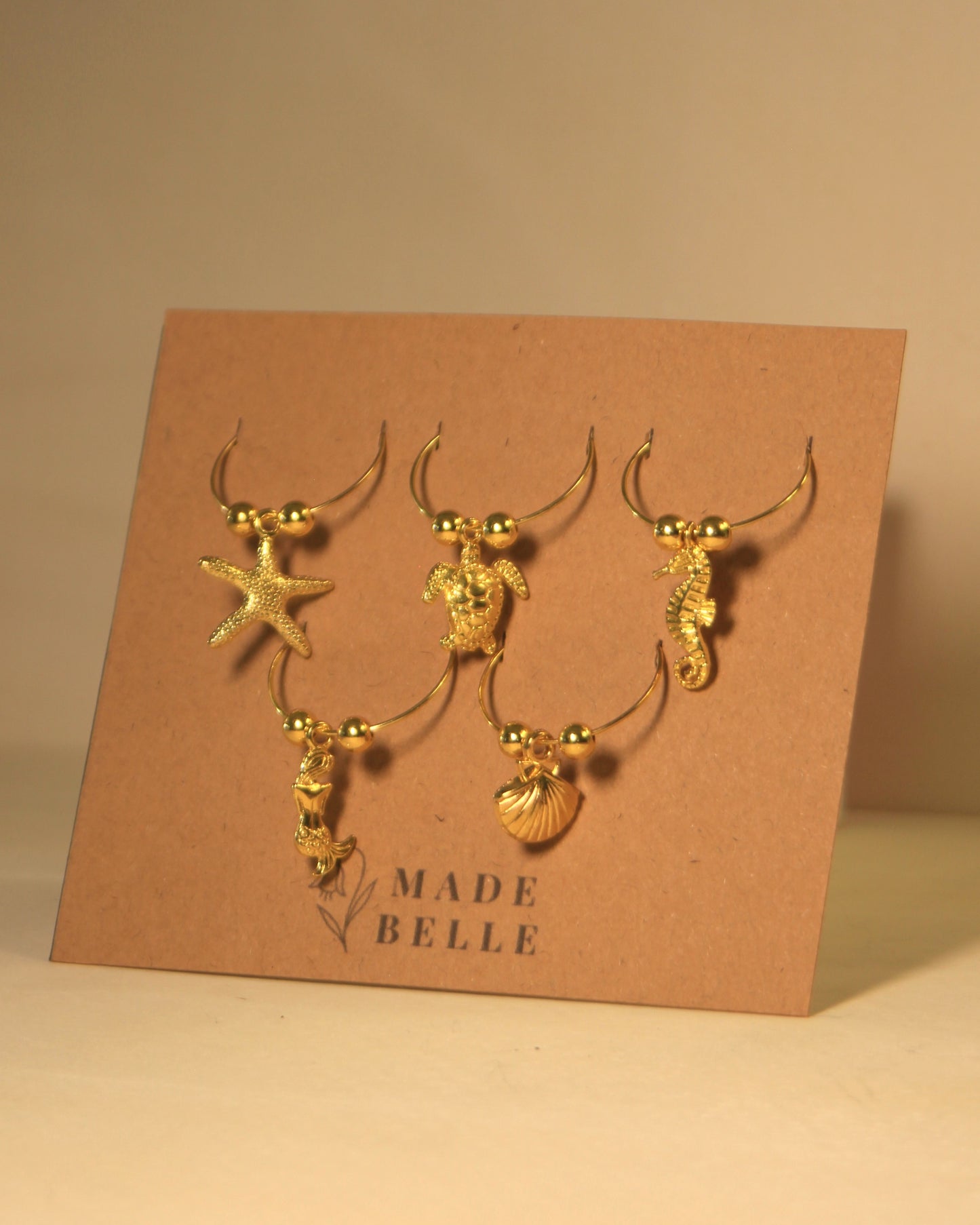 The Golden Reef Wine Charm Set