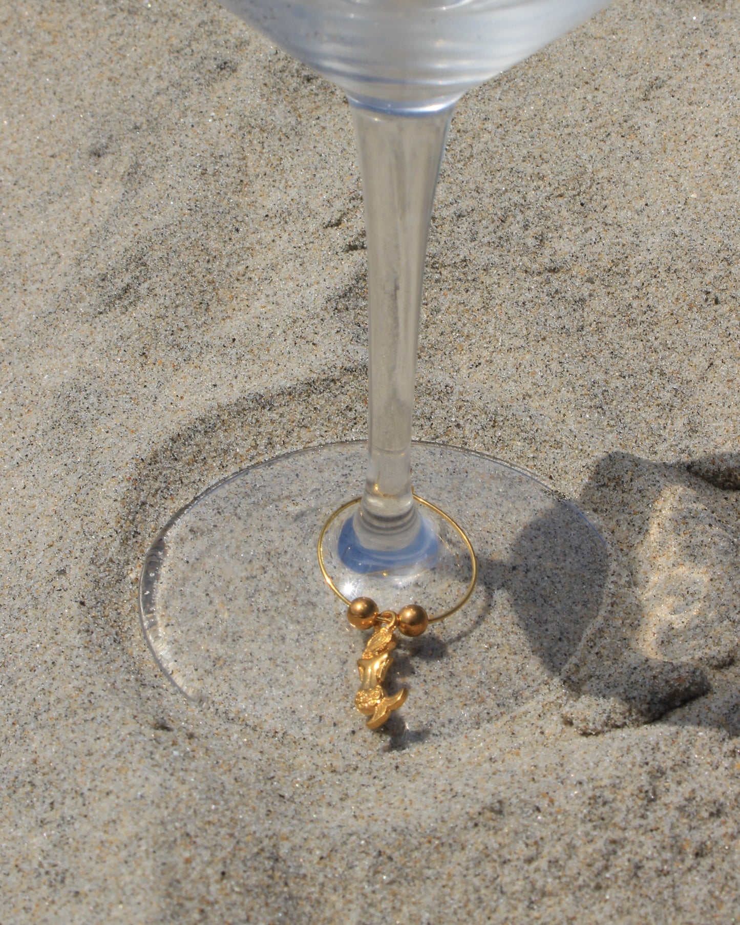 The Golden Reef Wine Charm Set