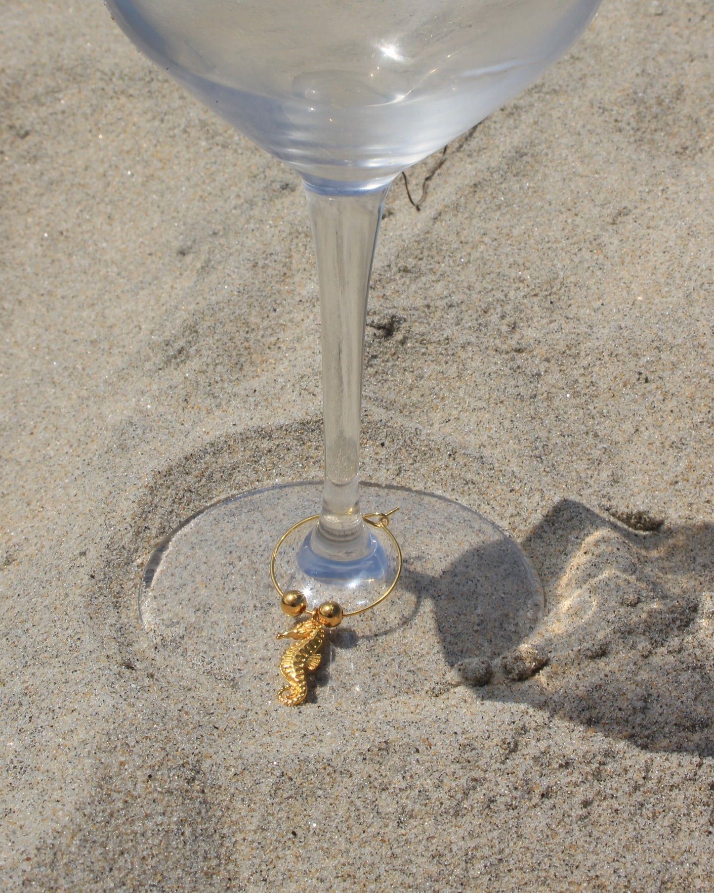 The Golden Reef Wine Charm Set